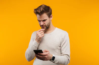 man-looking-at-phone-screen